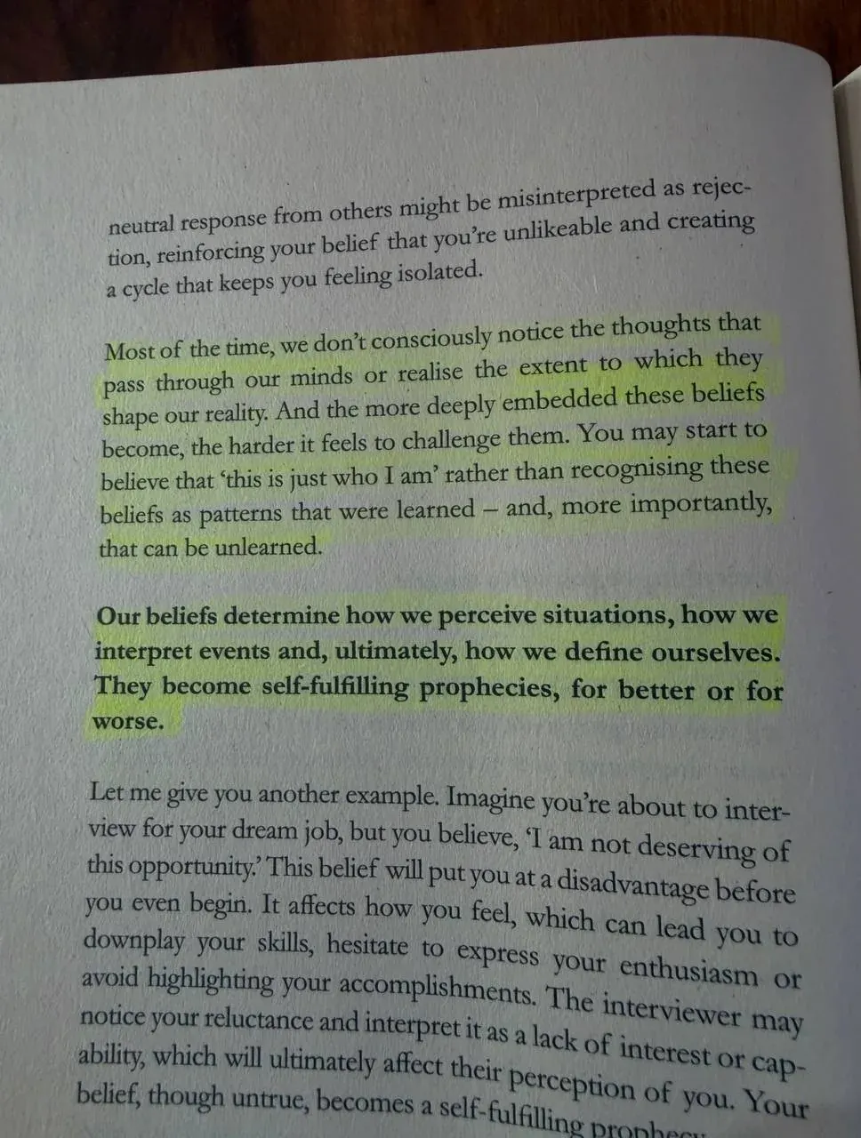 Portrait photo of a printed page about how beliefs shape our reality and can become self-fulfilling patterns Portrait photo of a printed page about how beliefs shape our reality and can become self-fulfilling patterns