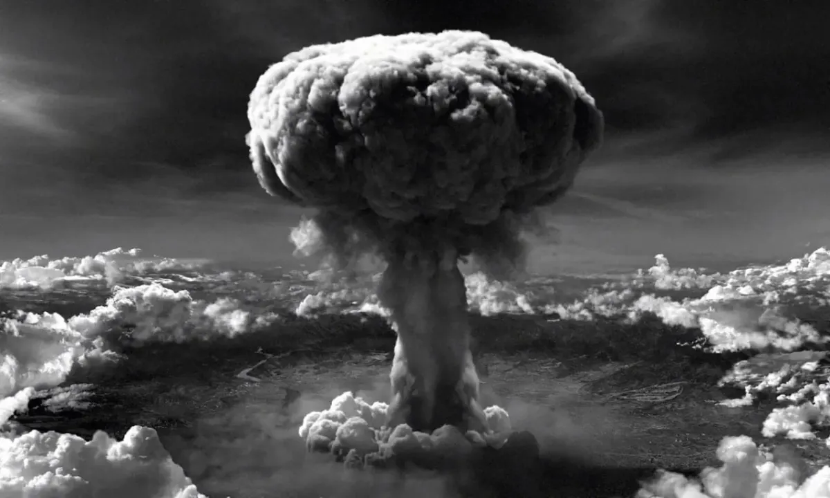 Black-and-white mushroom cloud explosion evoking the destructive stakes of totalitarianism and freedom in The Red New Deal book Black-and-white mushroom cloud explosion evoking the destructive stakes of totalitarianism and freedom in The Red New Deal book