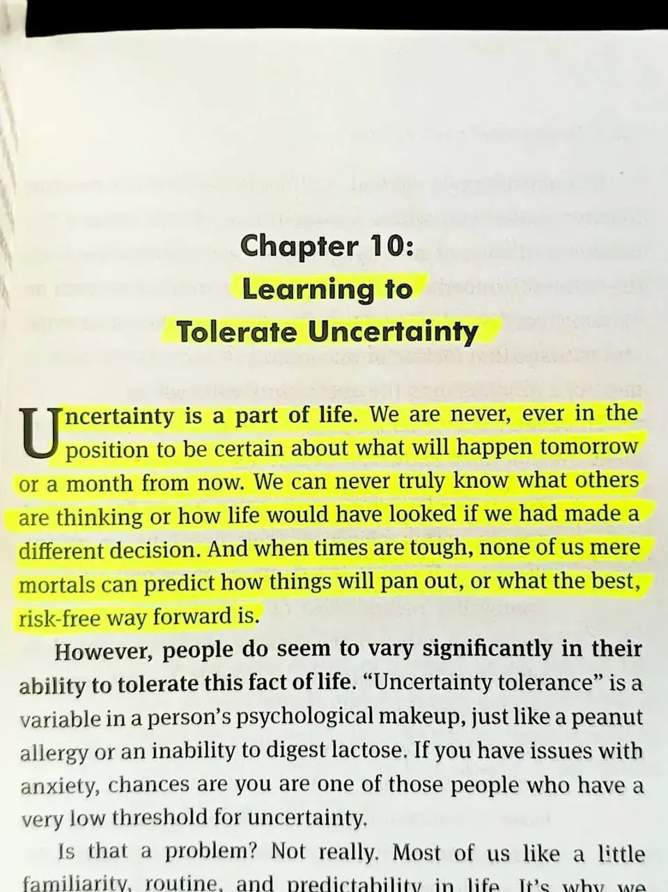 Portrait photo of an open book page titled Chapter 10: Learning to Tolerate Uncertainty