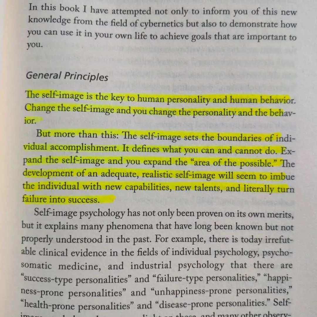 Close-up of a book page about self-image and personality, focusing on cybernetics and personal goals